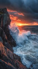 Fototapeta premium A breathtaking sunset over the turbulent Atlantic Ocean crashing against rugged cliffs during a dramatic evening sky