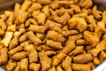 Sticks or strips of dough fried in pieces in a frying pan in oil (Pa Tong Ko), baursaks or chak chak are a traditional national dish.