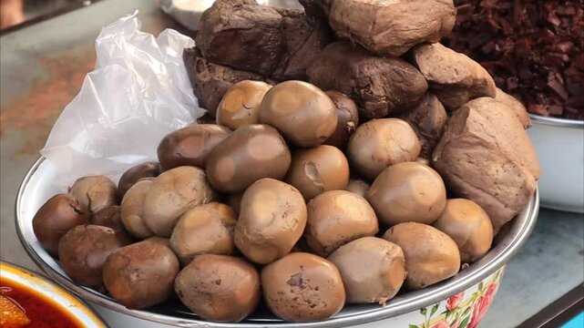close up of eggs and processed bacem for the culinary menu Gudeg typical of Yogyakarta Indonesia