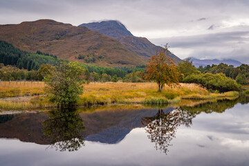 Autumn in Scotland with reflections in the lochs