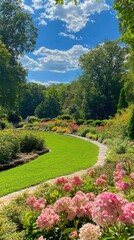 Obraz premium Lush gardens with vibrant flowers and clear blue skies under warm sunlight in a peaceful outdoor setting