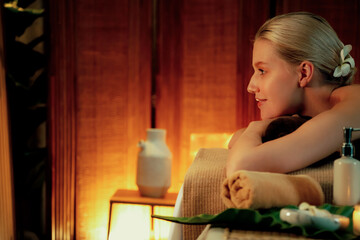 Caucasian woman customer enjoying relaxing anti-stress spa massage and pampering with beauty skin...