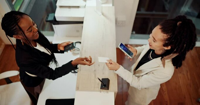 Business, woman and phone for payment at hotel with booking, luxury hospitality and concierge service. Girl, mobile and receptionist of finance transaction, room availability and reservation check in
