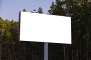 White billboard along the highway. Background for design and advertising. 
