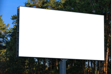 Fototapeta premium Background for design, white billboards on city streets and along roads in the summer day