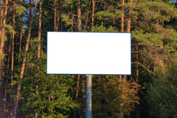 White billboard along the highway. Background for design and advertising. 