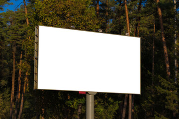 White billboard along the highway. Background for design and advertising. 