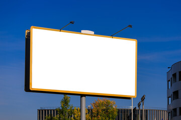 Background for design, white billboards on city streets and along roads in the summer day