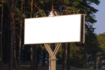 Background for design, white billboards on city streets and along roads in the summer day