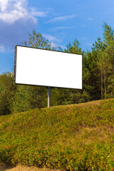 White billboard along the highway. Background for design and advertising. 