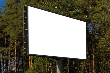 White billboard along the highway. Background for design and advertising. 