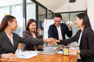 Asian Business Group Chat about graph work Present in meetings, in the office