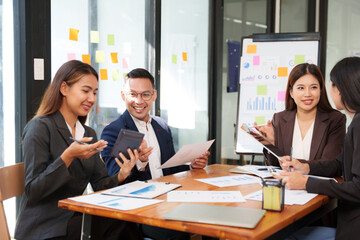 Group of Asian businessmen Sitting in meetings, talking, exchanging knowledge, presenting work.