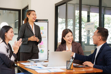 Group of Asian businessmen Sitting in meetings, talking, exchanging knowledge, presenting work.