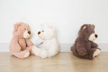 Two white and light brown soft teddy bears no talking with dark brown teddy bear. Plush toys...