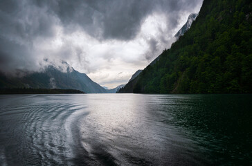 View on fjord of K&ouml;nigssee in Berchtesgadener Land on rainy day