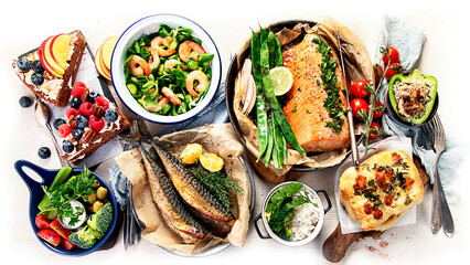 Assorted healthy seafood on plates for dinner or lunch.  traditional mediterranean cuisine