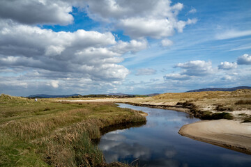 The stream that flows from Sheskinmore Nature Reserve to Ballinravey Strand between Ardara and Portnoo in Donegal - Ireland