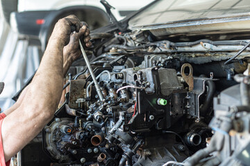 Fototapeta premium Auto parts repair in workshop close-up
