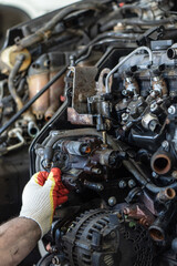 Auto parts repair in workshop close-up