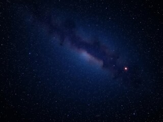 Fototapeta premium Bright and shining star in a dark night sky, celestial body, glowing