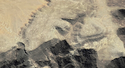 The landscape of the sandy desert in Qatar from a bird's eye view