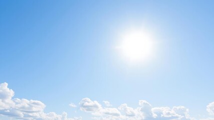 Fluffy white clouds covering a clear blue sky on a sunny day, serene, atmosphere