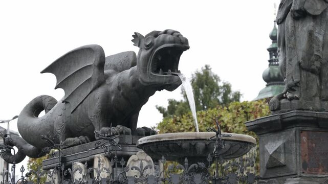 Lindwurmbrunnen Fountain (Lindworm Fountain) during daytime in Neuer Platz, Klagenfurt, Austria