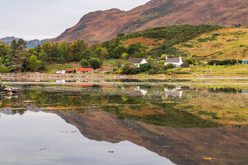 Fototapeta premium Autumn in Scotland with reflections in the lochs