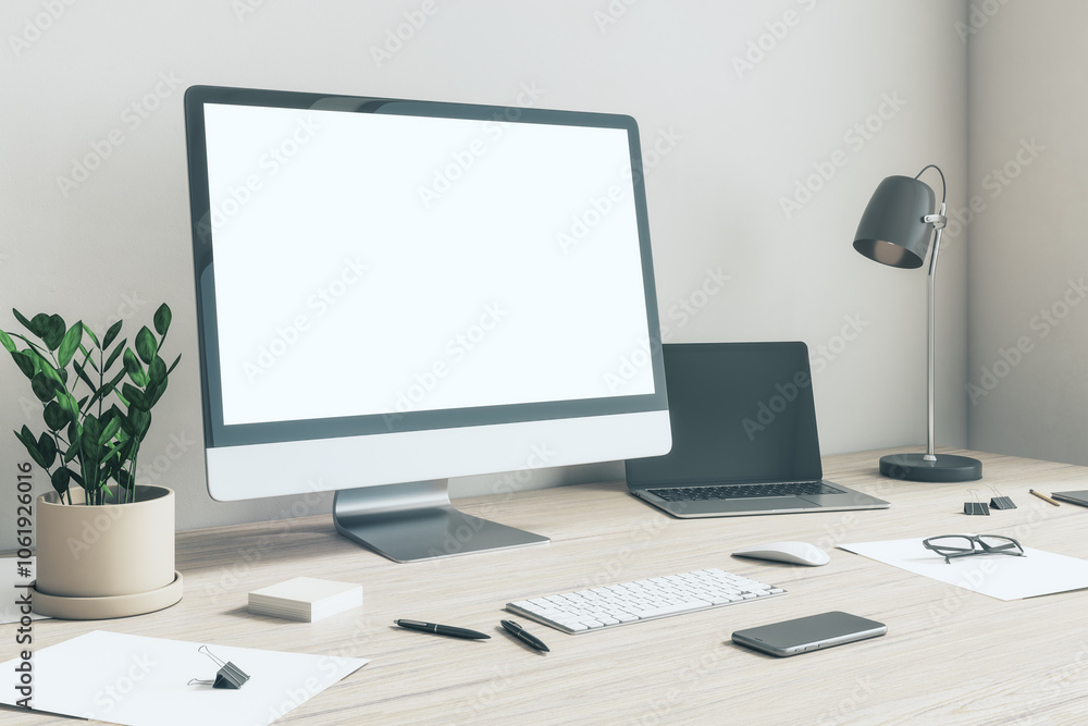 Poster side view on blank white modern computer monitor with copyspace in home office with light wall, dark
