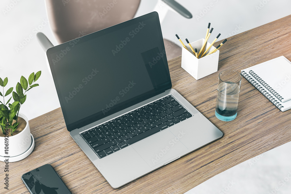 Aufkleber Top view on modern laptop with blank dark screen with empty space on brown wooden table with smartphone, flowerpot and glass of water on light floor with chair background. 3D rendering, mockup