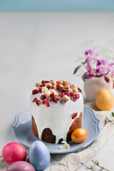 Spring Easter baking on a light table among flowers and painted eggs