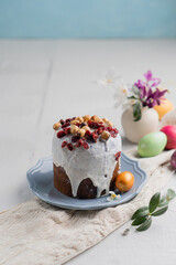 Spring Easter baking on a light table among flowers and painted eggs