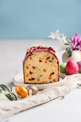 Easter cake with raisins in a cut on a light background
