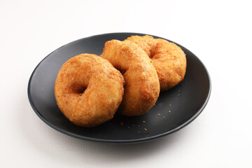 Traditional breakfast of South India IDLY VADA served with sambar Chutney in a ceramic plate