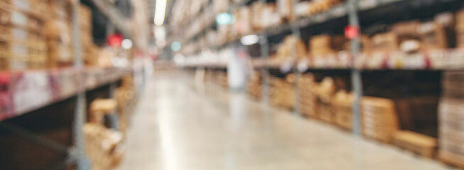 Fototapeta premium Banner Warehouse background storage inventory shelf freight container aisle space. Goods supply lot shelf store box pallet. Banner packaging on steel rack aisle storehouse inventory with copy space