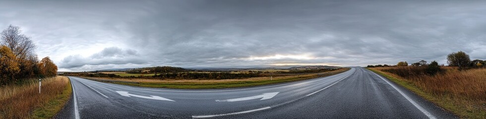 Fototapeta premium Scenic road winding through rural countryside landscape
