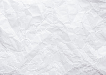 Closeup of white crumpled paper for texture background.