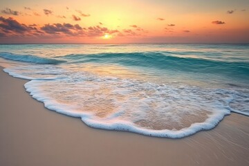 Obraz premium Breathtaking sunset over sandy beach with gentle waves and soft colors highlighting the serenity of nature