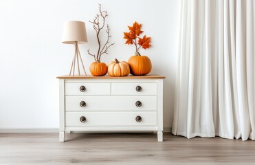 Autumn decor embracing seasonal vibes with pumpkin arrangements and cozy touches