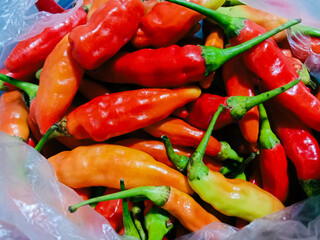 A pile of cayenne pepper in plastic.