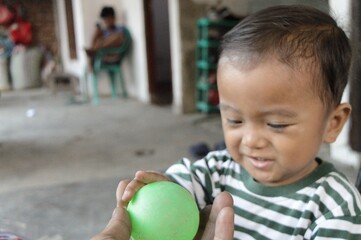boy playing with ball