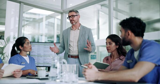 Workshop, presentation and doctors with business people in meeting for research grant, partnership and feedback. Healthcare, medical funding and approval with team in hospital for investment support