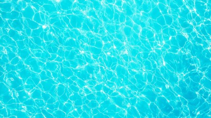 Obraz premium Aerial View of Tranquil Swimming Pool, shimmering water surface reflecting sunlight, inviting blue tones, serene atmosphere, capturing the essence of leisure and relaxation.