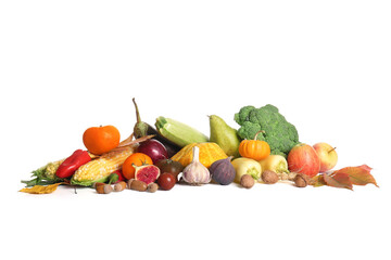 Different fresh vegetables with fruits and acorns on white background. Harvest festival