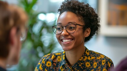 Happy sustainability officer discussing green strategies with a team, filled with purpose