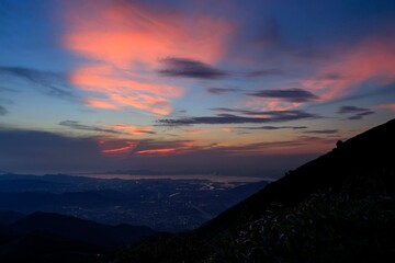  Breathtaking Sunrise Paints the Sky Over a Silhouetted Mountain Range