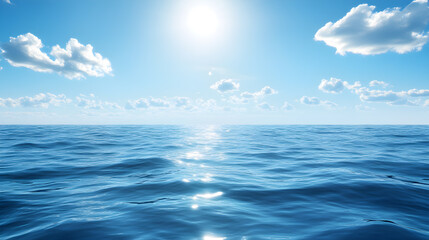 Obraz premium A view of the sea with the sky and sunlight shining down on it.