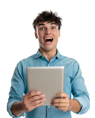excited young man holding tablet and being enthusiastic