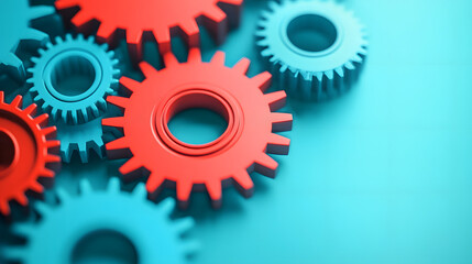 Close-up of red and blue gears interlocking on a teal background, representing teamwork, collaboration, and mechanical precision, with a focus on vibrant color contrast.